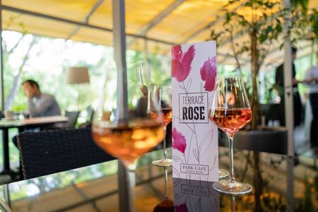 Glasses of rose wine on summer terraceの写真素材