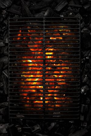 Coal backgraund withe black grate black background top view fire smolder coalの写真素材