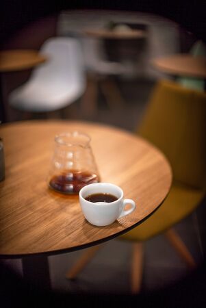 Black filter coffee on the table in cafe service kettle hario pour over cup side viewの写真素材