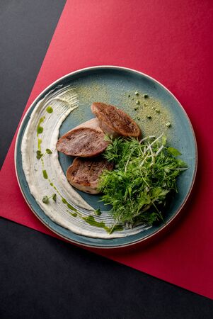 Beef tongue grill salad microgreen sauce cuisine cafe restaurant top view saltedの写真素材