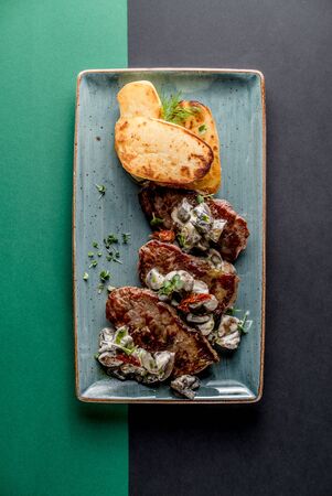 Beef steak sauce pepper potatos cafe restaurant grill cuisine top viewの写真素材