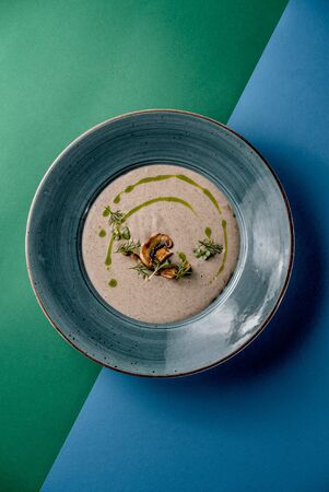 Soup mushroom cream olive oil restaurant cafe dish traditional top viewの写真素材