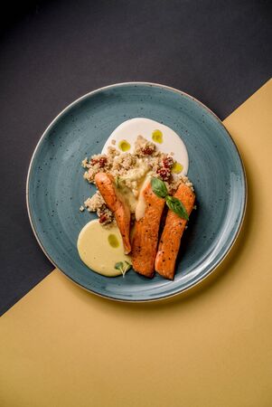 Grilled salmon quinoa tomato sauce mint grill traditional cuisine top viewの写真素材