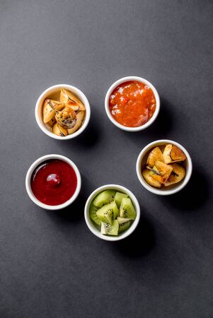 Topping dessert fruits qiwi apple pear jam berries top view deliciousの写真素材