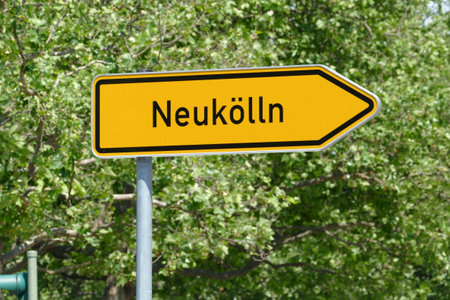 Street sign with the inscription: NewkÃ¶lln (NeukÃ¶lln), the district of the same name in Berlinの写真素材