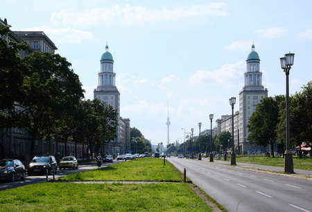 Berlin, Germany, June 17, 2021, view through Frankurter Tor towards Alexanderplatz with Karl-Marx-Allee and TV tower in the backgroundのeditorial素材