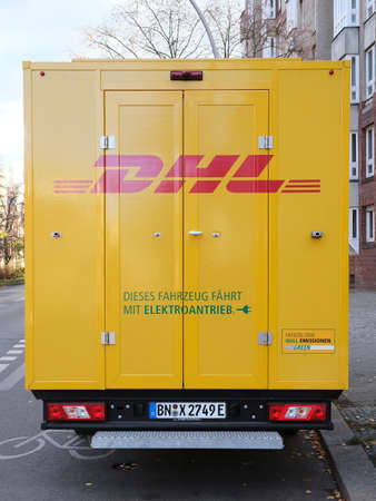 Berlin, Germany, November 22, 2021, DHL transporter with the inscription: This vehicle runs on...
