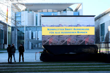 Berlin, Germany, March 1, 2022, demo screen in front of Chancellery demanding: complete Swift...
