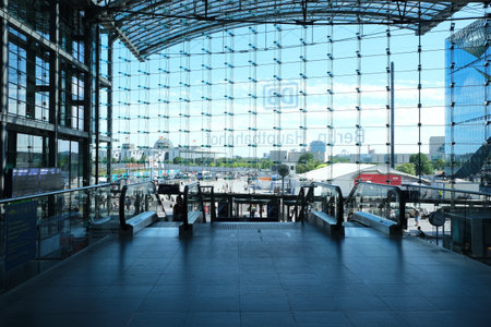 Berlin, Germany, July 14, 2022, view through the glass facade of the entrance hall in the main station towards Potsdamer Platz with the buildings of the government quarter in the backgroundのeditorial素材