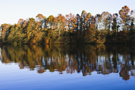 Blue lake in the fall. Horizontal shot.の写真素材
