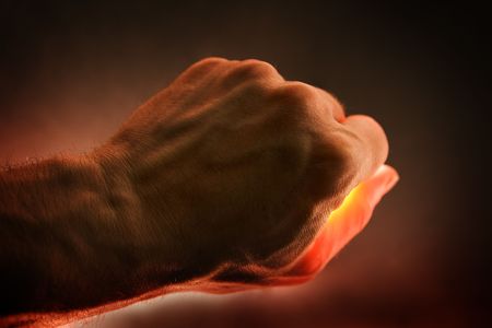 Hand with red light effect. Horizontal shot.の写真素材