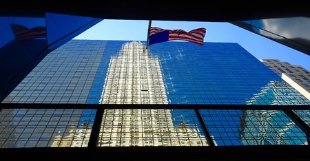 reflections on skyscraper facades in New York with flag Ã Â© WADA Ricanのeditorial素材