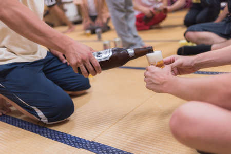 Iiyama, Nagano / JAPAN - SEPTEMBER 3rd 2018: Training of the Iiyama Autumn matsuri festivals, at the end of the training everyone is relaxing.のeditorial素材