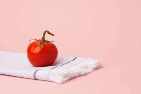 tomato on a dish towelの写真素材