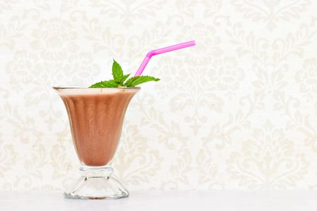 Chocolate milkshake with mint and strawの写真素材