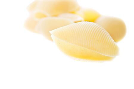 Large pasta shells on white with extreme shallow DOF.の写真素材