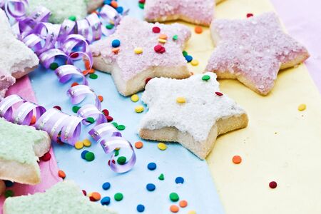 Star shaped cookies on a pastel background の写真素材