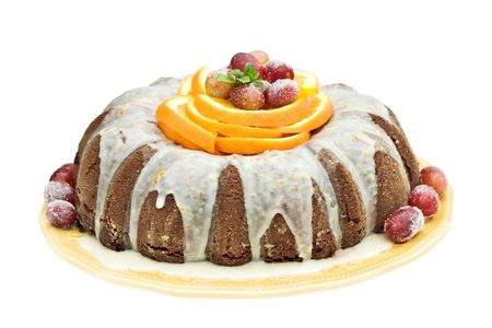 Mexican Chocolate Bundt Cake garnished with orange slices, sugar frosted grapes and mint.の写真素材