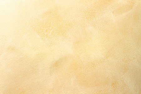 Macro of stucco wall with soft warm tones. Macro of stucco wall with soft warm tones.