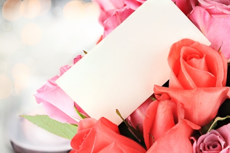 Blank card with a dozen roses. Shallow depth of field with copy space.の写真素材