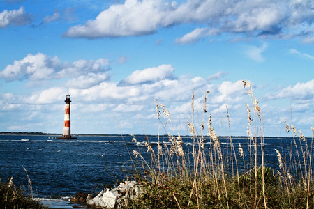 Lighthouse on a beautiful autumn day.の写真素材