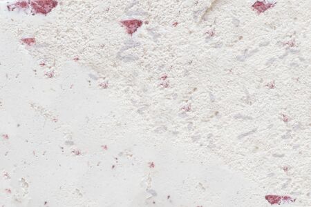 Flatlay view of strawberry ice cream background texture. Top view.