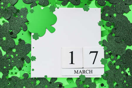 Happy St Patrick's day. White wood calendar blocks with the date March 17th.の写真素材
