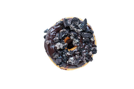 Flatlay of chocolate frosted donut with crumbled cookies isolated over a white background with clipping path included.の写真素材