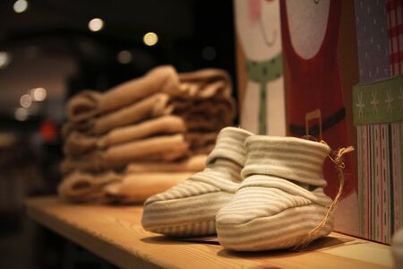 cotton baby shoes on the rackの写真素材