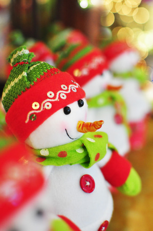 snowman display in a row with bokeh effectの写真素材