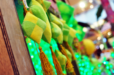 Close Up Ketupat Decoration hanging on kampung house during hari rayaの写真素材