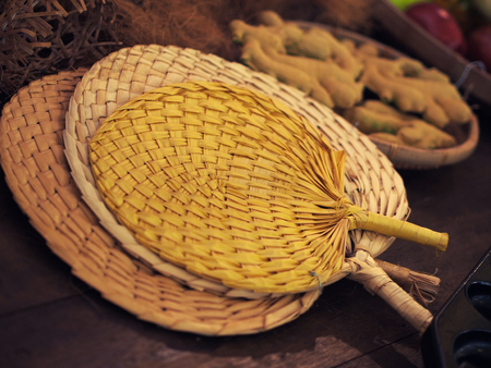 vintage Malaysian handmade weaved fan, resembling Malaysian cultureの写真素材
