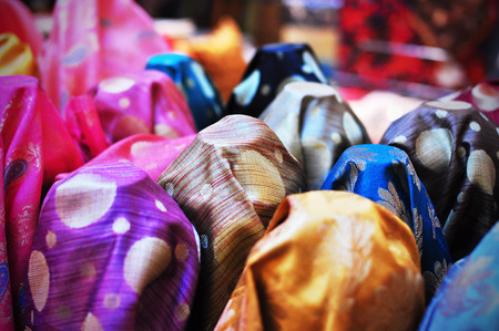 Choices for Textiles, fabrics with different designs and colours on sale at shopの写真素材