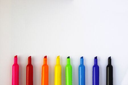 Rainbow colored marker tips on white backgroundの写真素材