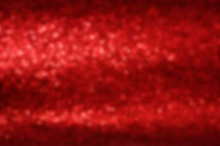 abstract red sparkly background with gradient and horizontal linesの写真素材