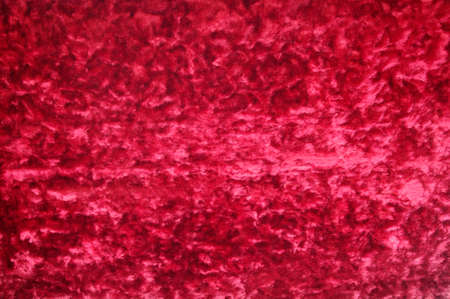 crushed red  velvet fabric background textureの写真素材