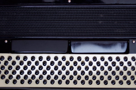 close up of vintage accordion black buttons with copy spaceの写真素材
