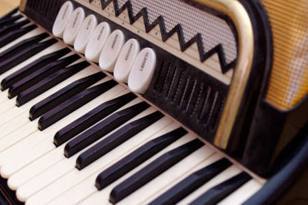 close up of vintage accordion keys and buttonsの写真素材
