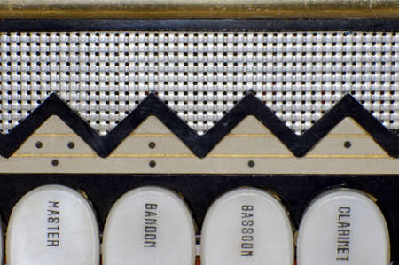 close up of vintage accordion keys and buttonsの写真素材