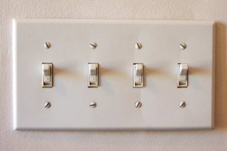 panel of four light switchesの写真素材