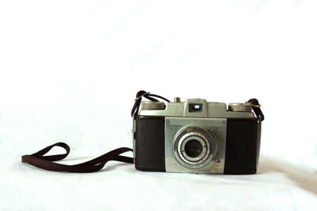 close up of old vintage film camera on white with copy spaceの写真素材