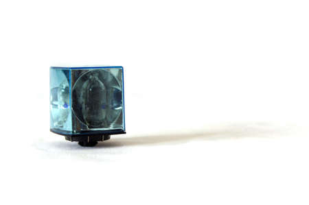 close up of old vintage film camera flashcube on white with copy spaceの写真素材