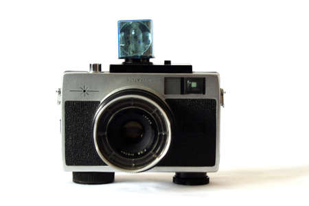 old vintage film camera with flashcubes on white with copy spaceの写真素材