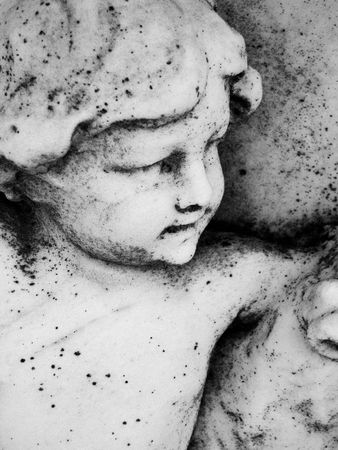 Close up of a granite carved faceの写真素材