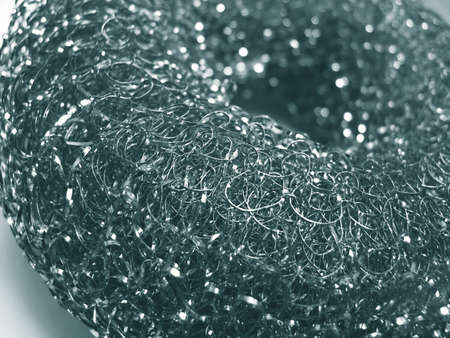 Macro duotone of circular metal coils with shallow DOFの写真素材