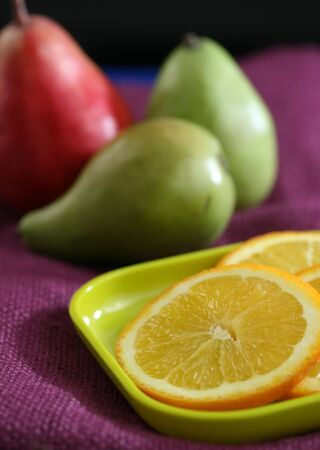healthy colorful fruit sliced and ready to eatの写真素材