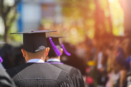 Rear view of Graduates join the graduation ceremony at the university. Education concept.の写真素材