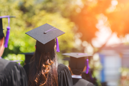 Rear view of Graduates join the graduation ceremony at the university. Education concept.の写真素材