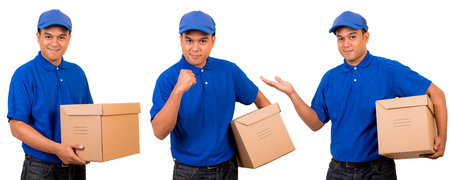 Young asian delivery man in blue uniformの写真素材