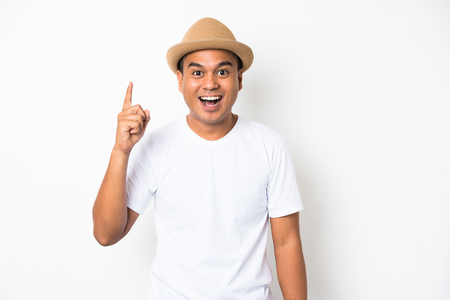 Happy asian man thinking on isolate. Idea concept.の写真素材